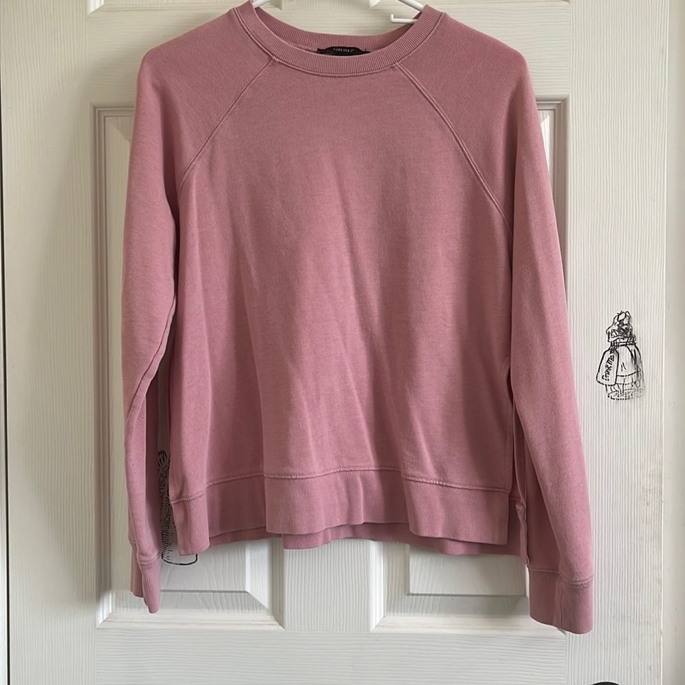 Pink crew neck sweater slits on the sides